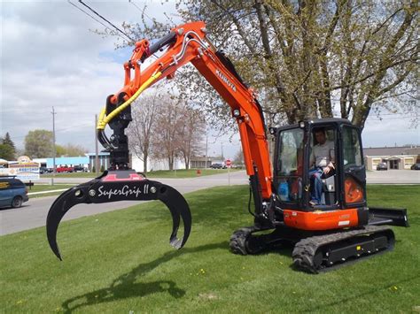 grapple mini excavator|grapple attachment for mini excavator.